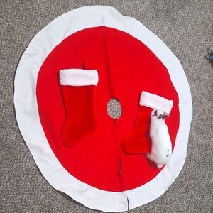 used christmas Tree Skirt and 2 Stockings. Red/white